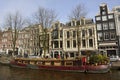 Houseboat along Prinsengracht canal in Amsterdam